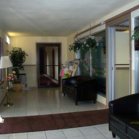 Budget Inn & Suites Wall Exterior photo