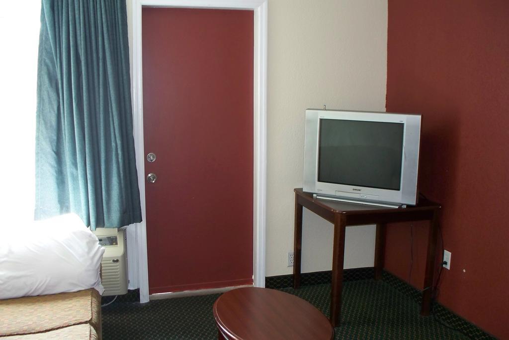 Budget Inn & Suites Wall Exterior photo