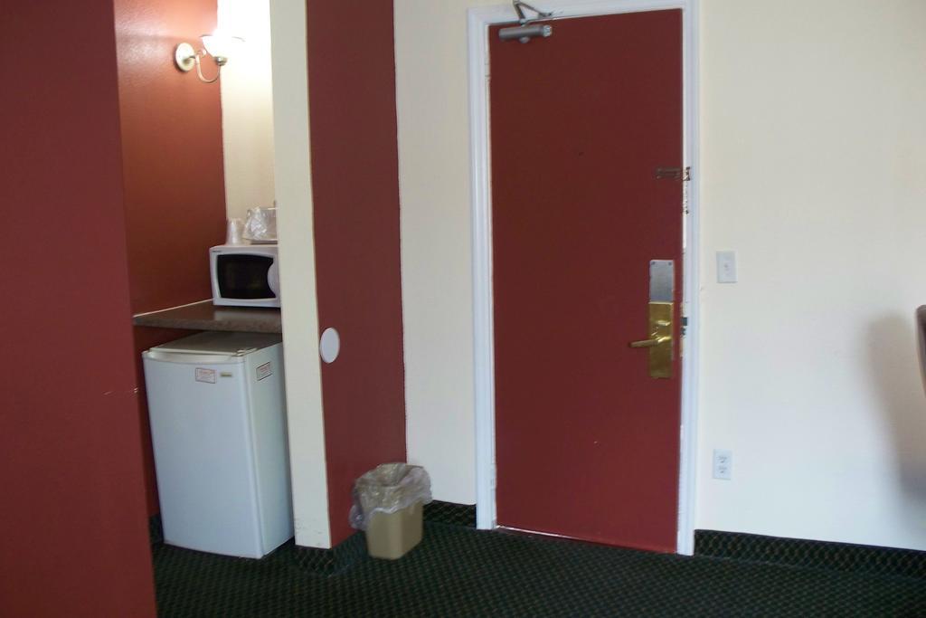 Budget Inn & Suites Wall Exterior photo