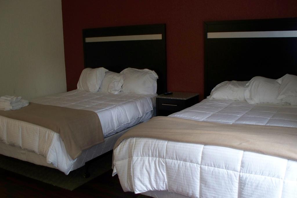 Budget Inn & Suites Wall Exterior photo